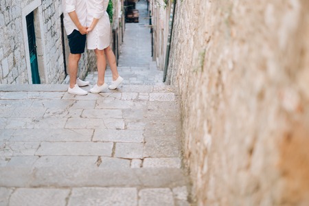 Legs is newlywed on the stone floor. Wedding in Montenegro.の写真素材
