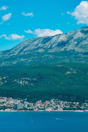 Herceg Novi, the view from the shore on the contrary, against the background of mountains and sky, Montenegro, Adriaticの写真素材