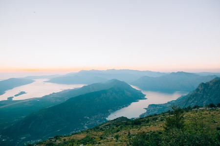 Bay of Kotor from the heights. View from Mount Lovcen to the bay. View down from the observation platform on the mountain Lovcen. Mountains and bay in Montenegro. The liner near the old town of Kotor.の写真素材