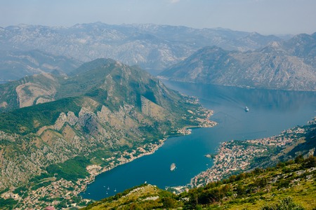 Bay of Kotor from the heights. View from Mount Lovcen to the bay. View down from the observation platform on the mountain Lovcen. Mountains and bay in Montenegro. The liner near the old town of Kotor.の写真素材