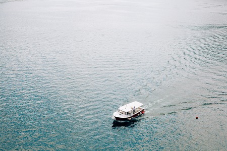 Tourist boat in the sea. Bay of Kotor. Montenegro.の写真素材