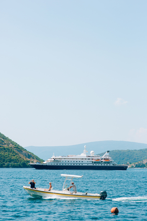 Huge cruise ship in the Bay of Kotor in Montenegro. A beautiful country to travel.の写真素材