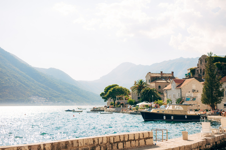 The old town of Perast on the shore of Kotor Bay, Montenegro. The ancient architecture of the Adriatic and the Balkans. Fishermens cities of Europe.の写真素材
