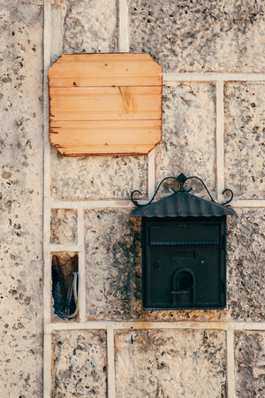 Board for inscriptions on the wall of a building in Montenegro.の写真素材