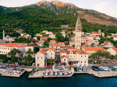 The old town of Perast on the shore of Kotor Bay, Montenegro. The ancient architecture of the Adriatic and the Balkans. Fishermens cities of Europe.の写真素材