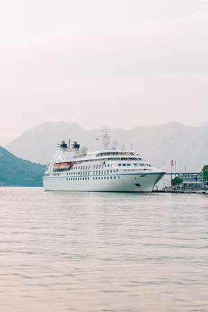 Huge cruise ship in the Bay of Kotor in Montenegro. Near the old town of Kotor. A beautiful country to travel.の写真素材