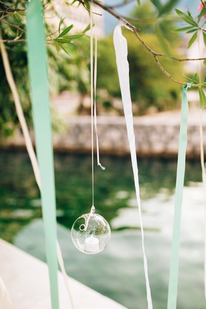 Candles in glass lamps. Wedding decorations. Wedding in Montenegro.の写真素材
