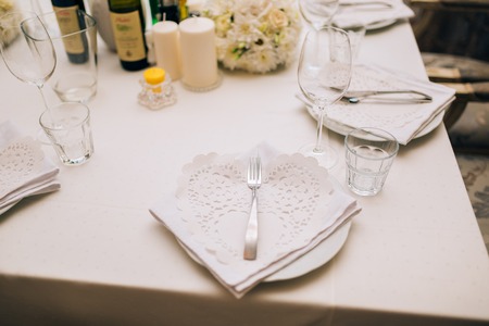 Plates at the wedding banquet. Table setting. Wedding decorations. Wedding at the sea in Montenegro.の写真素材