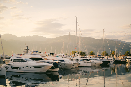 Moored boats in the Bay of Kotor, on the background of the peninsula Lustica in Montenegro. Away from the coastの写真素材