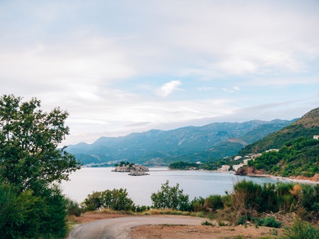 Sveti Stefan Island, view from the beach of Crvena Glavica. Montenegro, the Adriatic Sea, the Balkans.の写真素材