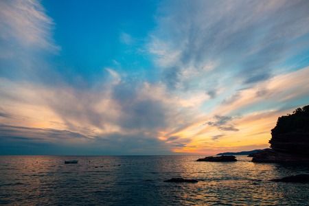 Sunset over the sea. Sunset over the Adriatic Sea. Sun to sit down in the waterの写真素材