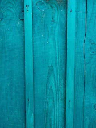Old blue doors. Wood texture. Texture of metal. Old shabby, irradiated paintの写真素材