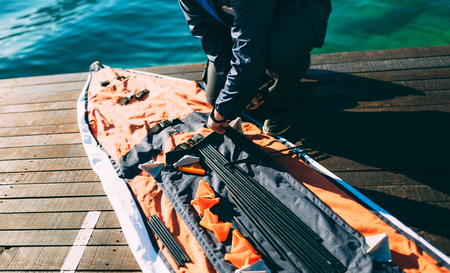 Folding kayak. Assembling the kayak on the shore of the Bay of Kotor.の写真素材