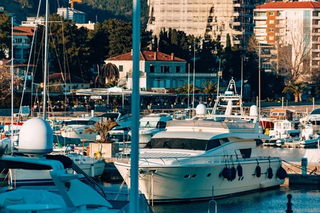 Boats moored on the quay near the old town of Budva, in Montenegro, the Adriatic Seaの写真素材