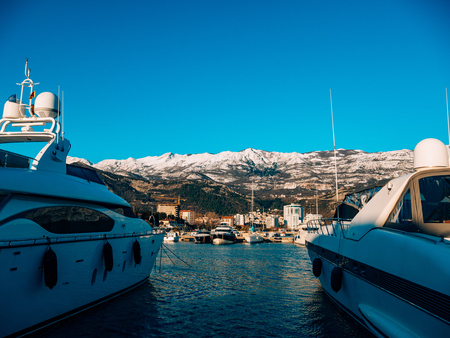 Luxury yachts on the coast in winter season. Marina in Budva, Montenegroの写真素材