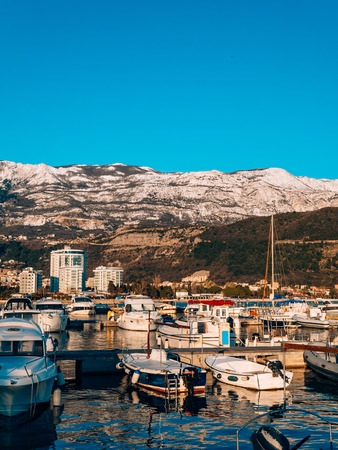 Luxury yachts on the coast in winter season. Marina in Budva, Montenegroの写真素材