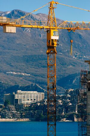 Construction of a multi-storey building. The crane is working. Budva, Montenegro.の写真素材