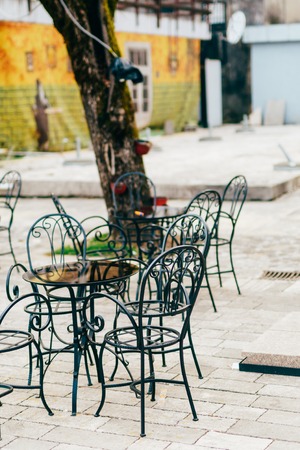 Tables in cafe on the street. Street Cafe. Restaurants in Montenegro.の写真素材