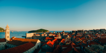 Dubrovnik Old Town, Croatia. Tiled roofs of houses. Church in the city. City View from the wall.の写真素材