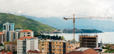 Budva building construction. Construction crane high-rise building in the center of Budva, Montenegroの写真素材