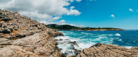 Rocks on the sea in Montenegro. Rocky coast. Wild beach. Dangerous coast.の写真素材