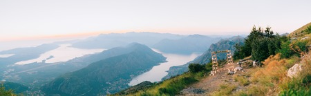 Wedding in Montenegro. Wedding Arch on Mount Lovcen, Montenegro. Kotor Bay View. Wooden arch with candlesの写真素材