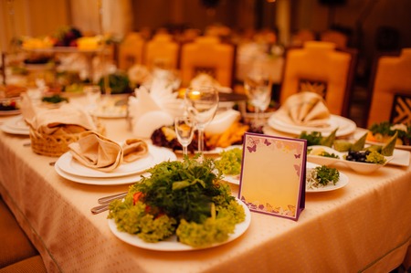 Wedding banquet, tables with food in the restaurant.の写真素材