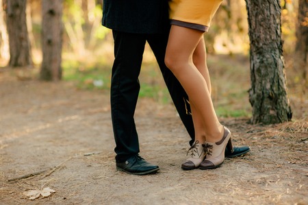 Female and male feet on grass. Wedding in Montenegroの写真素材