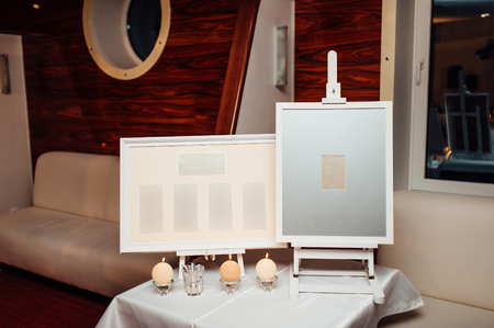 The sign at the wedding. Wedding chairs and fall foliageの写真素材