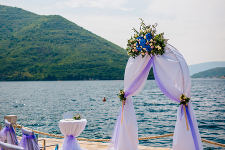 Arch for the wedding ceremony on the seaの写真素材