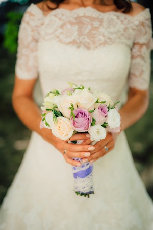 Wedding bouquet in hands of the bride. Wedding in Montenegroの写真素材