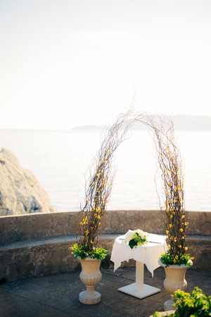Arch for the wedding ceremony on the seaの写真素材