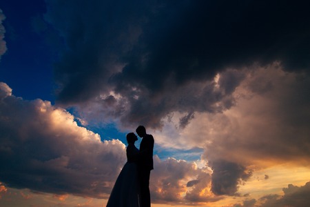 Silhouettes at sunset on Mount Lovcen in Montenegroの写真素材