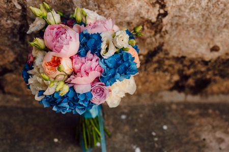 Wedding bouquet on a stone background. Wedding in Montenegroの写真素材