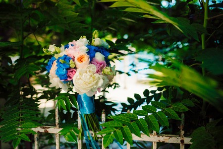 Wedding bouquet on a green background. Wedding in Montenegroの写真素材