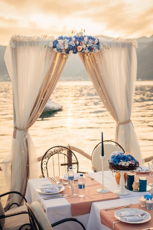 Wedding table on the shore. Wedding in Montenegroの写真素材