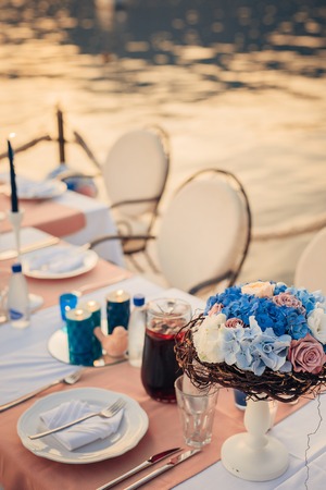 Flower compositions on the wedding table by the sea in Montenegro.の写真素材