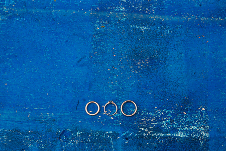 Wedding rings on a textured background. Wedding in Montenegroの写真素材