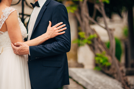 Newlyweds hug each other in Montenegro. Wedding in Montenegro.の写真素材
