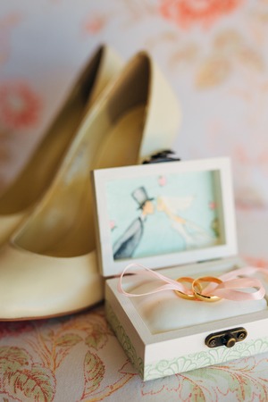 Wedding rings of the newlyweds in a box. Engagement gold rings. Wedding in Montenegro.の写真素材