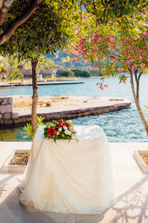 A table for a wedding ceremony in Montenegro. Wedding decorations.の写真素材