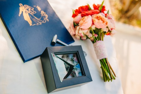 Wedding rings of the newlyweds. Engagement gold rings. Wedding in Montenegro.