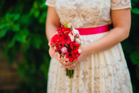 Wedding bouquet in hands of the bride. Wedding in Montenegroの写真素材