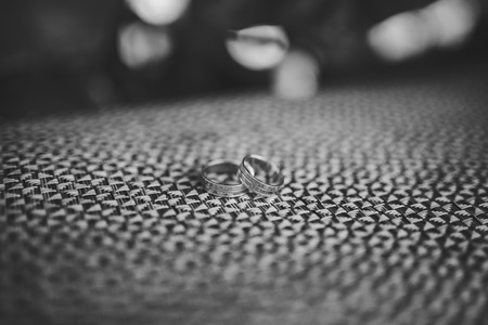 Wedding rings on a textured background. Wedding in Montenegroの写真素材