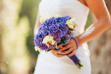 Wedding bouquet in hands of the bride. Wedding in Montenegroの写真素材