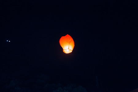 Sky lanterns, flying lanterns, floating lanterns, hot-air balloons Loy Krathong Festival in Chiang Mai Thailandの写真素材