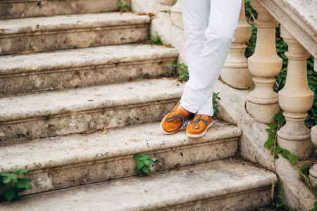 Male feet close-up. Feet grooms at a wedding in Montenegro.の写真素材