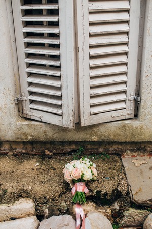 Wedding bouquet on a window. Wedding in Montenegroの写真素材