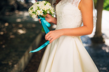 Wedding bouquet in hands of the bride. Wedding in Montenegroの写真素材
