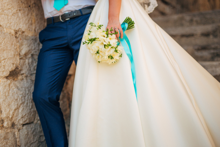 Wedding bouquet in hands of the bride. Wedding in Montenegroの写真素材